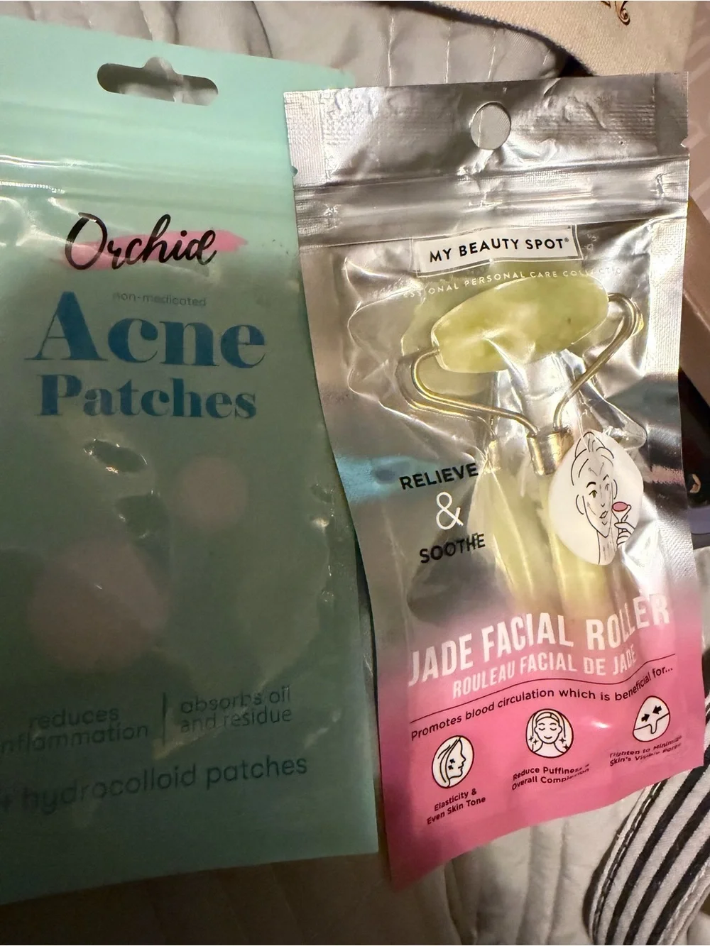 Jade Facial Roller + Pink Hello Kitty Lip Tint bag etc